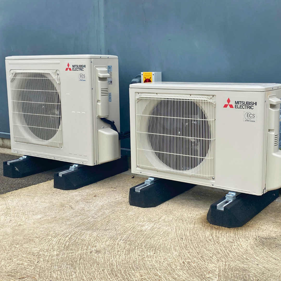Heating and cooling systems that are centrally programmed, controlling output to working hours and the power down of all non essential equipment outside of working hours.